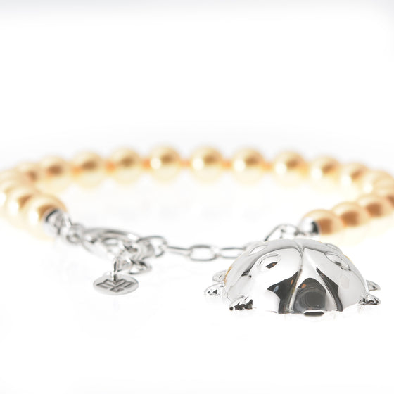 Bracciale in perle e catena in argento con pendente Coccinella