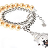 Bracciale doppio in perle e catena con pendente Coccinella