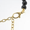 Bracciale in perle e catena in argento con pendente Sole