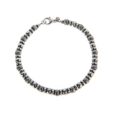 Braccialetto in argento brunito con sfere rigate e lisce
